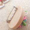 broche bordado detrás