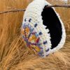 orejeras tejidas con bordado nordico