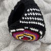 orejeras tejidas en espiral de colores